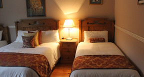 Family room with a double bed and two single beds
